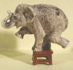 Klima K3921c Elephant Balancing on Stool, about 2" high, porcelain miniature, excellent condition. <BR>