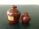 <BR><BR>Pair of Old Souvenir Small Crock Jugs.  The large one has a label on one side that says THE LITTLE BROWN JUG with a Harness Racer image in the center and says WORLD PACING CLASSIC Delaware, Oh...