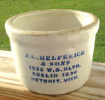 Old Butter Crock from J.C. Helferich & Sons 1552 W.G. Blvd. Euclid 1234 Detroit, Mich.  About 6 1/2" across the top and 4 1/2" high.  Solid, but does have a few hairlines, one of which goes ...