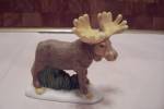 Nice collectible decorative porcelain Bull Moose figurine.  Has Philippines sticker on bottom.  3-1/2" long.  Very good condition but with glue repair on the base of the antlers.  1980s.