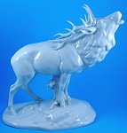 Von Schierholz White Gloss Elk Figurine, 10 7/8" high.  One spike point replaced (right side closest to head), missing the end of a leaf, 3 tiny dots of brown in the glaze. 