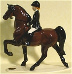 Hagen-Renaker Specialty Saddlebred in Training or Trail Riding with Child (incorrectly called Dressage Horse by H-R), #4002, current figurine.  