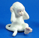 K654 White Monkey, 1 1/8" high.  New porcelain miniature figurine. 