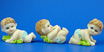 Klima Miniature Baby Trio, about 7/8" highest.  New polyresin figurines. 