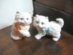 Two Vintage Homco Persian Kitten Figurines,both all white,one kitten has blue bow,the other has a pink bow, Kittens are about 3" and 4" tall. Good dusty condition, kitten are #1428,so cute!