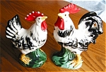 Vintage Japan rooster and hen figurines. c:pre WW2. Good size vintage rooster and hen with green backstamp: Japan in a wreath symbol. They have no chips or cracks and the rooster is 6 tall x 4 wide. J...