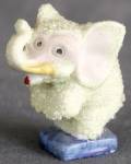 Charming 2 1/8" tall butter yellow elephant standing on a blue pillow will be sure to make you smile! Covered with large glass glitter. Has 1 tiny chip on edge of ears.                           ...