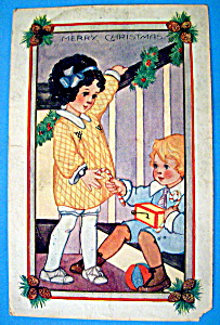Merry Christmas Postcard W/girl & Boy Sitting On Stairs