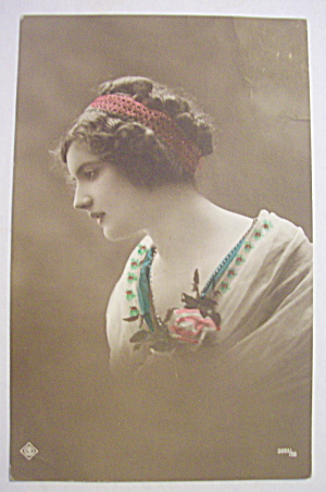 Woman Sitting And Staring Away From Camera Postcard