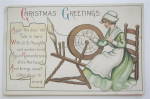 Woman Sewing Christmas Greetings Postcard