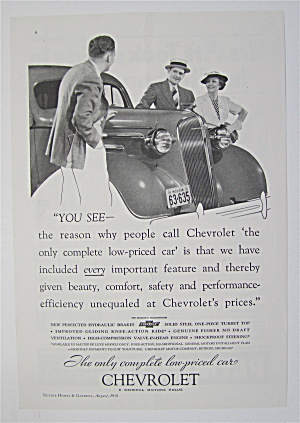 1936 Chevrolet with Man Talking with a Couple  (Image1)