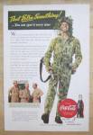 Click to view larger image of 1943 Coca-Cola with Soldier Walking with Gun (Image1)