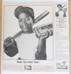 1966 Riceland Rice with Boy Holding a Bat & Bag of Rice