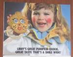 Click to view larger image of 1986 Libby Solid Pumpkin with Girl Holding Cookie (Image4)