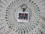 Click here to enlarge image and see more about item 1007-23: vintage Bon Jove Key Chain Light Have a Nice Day