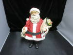Click here to enlarge image and see more about item 720-16: Clothtique Midwest Imports Santa with Bell and Toy Sak