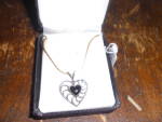 Click here to enlarge image and see more about item MB-JE731: Sterling Silver Heart Necklace with Onyx