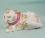 Click here to enlarge image and see more about item 00121: 1986 Franklin Mint Porcelain Lying Cat
