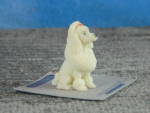 Click here to enlarge image and see more about item 00590: United Design Itty Bitty World Resin Sitting Poodle