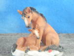 Click here to enlarge image and see more about item 00635: 1999 Enesco Seagull Collection Resin Mare and Foal