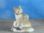 Click here to enlarge image and see more about item 00636: 1999 Enesco Seagull Collection Resin Wolf and Cubs