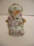 Click to view larger image of Kitten On A Parlor Chair Porcelain Figurine (Image1)