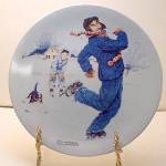 Click here to enlarge image and see more about item pltrckwlskgrnp1: Norman Rockwell plate 'Ice Skating with Grandpa' 2004