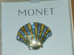 Click here to enlarge image and see more about item 1824: Vintage Monet Rhinestone Shell Pin Brooch Scallop in Box Yel/Bl/Silver