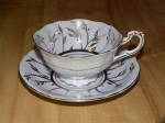 Click here to enlarge image and see more about item 2067: Vintage Paragon China Tea Cup & Saucer Inside Decor Orchid Silver Red 