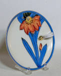 This Noritake Deco 5.5 inch  lemon server has a great look. The wild blue leaves with black outlines highlight the asymmetrically placed red blossom . The blue rim adds unity to the piece. Red wreath mark in very good condition.