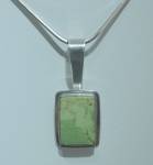 Click to view larger image of Sterling Silver Gaspeite Pendant signed Ras (Image1)
