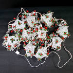 Click here to enlarge image and see more about item 15240: Noma Filigree Lanterns Lighted Christmas Garland