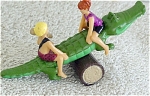 1994 Dakin polyvinyl Flintstones mini-action Figure of Pebbles and Bam-Bam who are riding a see-saw on a crocodile.  This mini-action figure was inspired by the Flintstones movie in 1994. It is approximately 2 to 3 inches in size. It is in new and mint condition. Click to expand listing to view of both photographs.