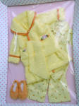 Effanbee 2014 10 In. Nighty Night Sleep Tight Patsy doll outfit by Robert Tonner, No. E14PTOF03 fits Patsy, Ann Estelle, and similar dolls with a bending knee child's body. It contains a yellow terry cloth robe with salmon pink trim; yellow floral cotton pajamas; and matching salmon fleece slippers The price is for the outfit only and does not include the doll modeling it. Limited edition of 300. New and mint-in-the-package with shipper. Expand listing to view all 4 photographs.