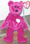 Ty, Inc. from 1998-1999, Valentina, No. 4223, the Magenta Red Bear with a White Heart beanie baby plush. This beanie teddy bear's birthday is February 14, 1998, Valentine's Day. This is a perfect Valentine's Day bear. She was introduced January 1, 1999 and retired December 23, 1999. This one has a 4th Generation tag. Valentino is approximately 9 inches in size from head to foot. Her verse is:
'Flowers, candy, and heart galore,
Sweet words of love for those you adore,
With this bear comes love that's true,
On Valentine's Day and all the year through!'
Retired bear is new and mint with tag condition. Has not been exposed to smoke or unpleasant odors. Expand listing to view both photographs.