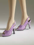 The Tonner Nu Mood Purple Sparkle High Heel No. 9 doll shoes, style No. T12NMAC21, fit the 16 inch Tyler Wentworth bodied and all Nu Mood high heel feet. This is a purple sparkle open toe mini platform sling back high heel pump.  New, Mint-in-the-Box. A single pair of Nu Mood doll shoes can ship by insured USPS First Class Mail postage.