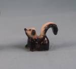 Click here to enlarge image and see more about item h03482: Hagen-Renaker Miniature Baby Skunk