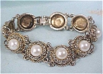 Click here to enlarge image and see more about item j00168: Unsigned Bracelet