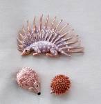 Click here to enlarge image and see more about item brooch11: Hedgehog Porcupine Brooches 3 pc