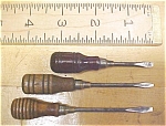 Click to view larger image of Antique Miniature Wood Handle Screwdriver group of 3 (Image1)
