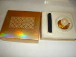 Click here to enlarge image and see more about item 2160s: Estee Lauder Solid Compact