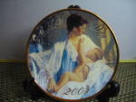 Click here to enlarge image and see more about item aminip11ad: Avon Held In Loving Arms Mother's Day 2003 Plate