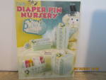 Click here to enlarge image and see more about item Annie871332f: Annie's Attic Plastic Canvas Diaper Pin Nursery #871332