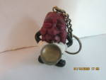 Click here to enlarge image and see more about item calrais6c: Vintage Califorina Rasins Figurine Sax Player Keychain