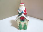 Click here to enlarge image and see more about item cbhol6j: Holiday Santa On House Porcelain Bell
