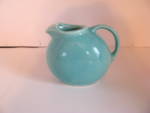Click here to enlarge image and see more about item jusa101: Vintage USA Teal Water Pitcher