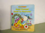 Click here to enlarge image and see more about item lgdbbook3: Book Disney Babies Baby Donald Goes To Playland