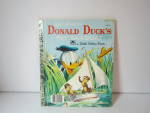 Click here to enlarge image and see more about item lgddbook1: A Little Golden Book Donald Duck's Toy SailBoat