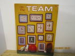 Click here to enlarge image and see more about item nsingles9d: Nanci Cross Stitch Craft Book On The Team  #9