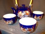 Click here to enlarge image and see more about item oeacpea1v: Blue Oriental Peacock Tea Set